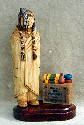 March 2004 - This little Indian is carved from basswood and is mostly unpainted. He stands about 7 inches tall. The darker areas were burned in with my little pyrographic burner.