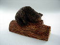June 2004 - I saw this picture in a magazine and thought it would be cute. Carved from basswood, measures about 4 in long x 2 in wide and finished with acrylic paint.