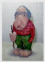 Sep. 2004 - The Scandinavian carving method is more crude than ours and I had a hard time leaving a few square edges. Was too tempted to round them out. 6 inches tall, carved from basswood, painted with acrylics and finished with double boiled linseed oil.