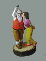 Dec 2004 - This is a three part carving. Santa, Momma and the base. Santa is holding a mistletoe over his head to tease momma.