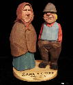 Sep. 2005 - Oskar and Sara were the first in their Scandinavian community to immigrate to America. After a stormy crossing and a seemingly endless train ride, they arrived at their new home, a recently settled community in Minnesota. Here Sara is wearing the earth tone clothing she was wearing when she arrived. - Carved from Basswood and painted with acrylics, they stand about 7 inches tall.