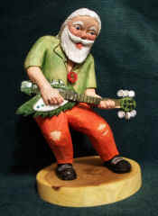 November, 2005 - This Santa is about 8 inches tall, carved from Basswood and finished with acrylics and boiled linseed oil.