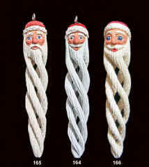 Dec 2005 - 3 more spiral Santas have joined the group, all about the same size but each one uniquely carved.
