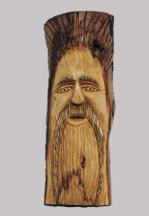 Feb - 2006 - I received a good sized piece of Apple wood several years ago but when I tried to carve it then, it was not dry enough. This carving is about 11 inches tall, 4 inches wide and much heavier than the Poplar Bark I usually use for this.