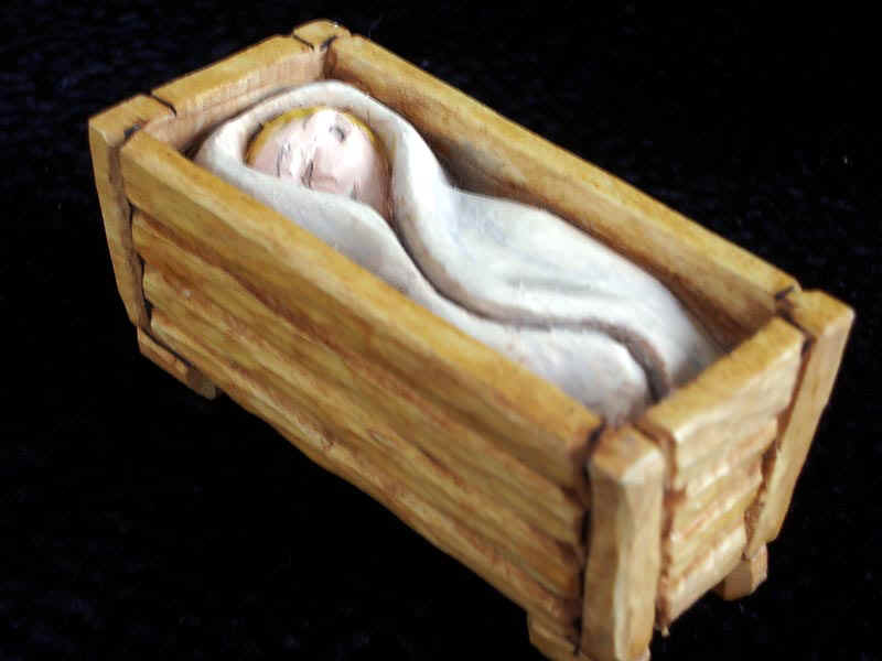 June 2006 - This is the first piece of a 15 piece nativity set I want to make. It is carved from Basswood, finished with acrylics and measures about1 1/2 inches high and 3 inches long.