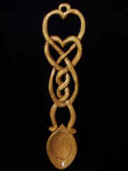 June 2006 - Celtic Love Spoon was carved from Butternut wood and finished with polyurethane gloss. It is 9 inches long.