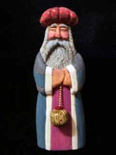 August 2006 - This is the sixth piece of the 15 piece nativity scene. Caspar, the first King is carved from basswood, finished with acrylics and stands about 8 inches tall. He carries Frankincense.