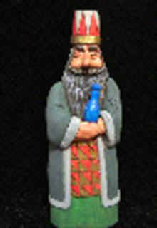 September 2006 - This is the seventh piece of the 15 piece nativity scene. Melchior, the second King is carved from basswood, finished with acrylics and stands about 8 1/2 inches tall. He carries Myrrh.