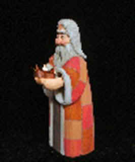 September 2006 - This is the eighth piece of the 15 piece nativity scene. Balthazar is carved from basswood, finished with acrylics and stands about 7 1/2 inches tall. He carries gold.