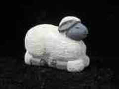 November 2006 - This is the twelfth piece of the 15 piece nativity scene. The lamb is carved from basswood, finished with acrylics and is about 2 inches tall and 4 inches long.