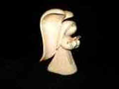 Dec 2006 - This little angel stands about 6 inches tall and carved from basswood. I chose not to paint this one to see how it would turn out.