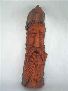 March 2007 - This wood spirit is carved from poplar bark and is 9 inches