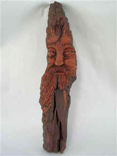 March 2007 - 12 inch Wood Spirit carved from Poplar Bark and actually finished with clear shoe polish.