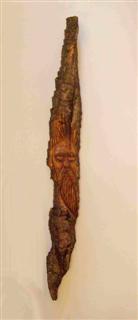 April 2010 - This is carved from poplar bark and measures about 21" tall.