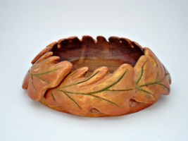 Sep 2010 - This is a 7 inch hand carved bowl. The wood is willow and because it had very little color, I added a splash of acrylic paints. The inspiration for this one came from Wood Carving Illustrated. Because I am not completely happy with the result, it is very unlikely I will carve another one but will stick to my caricatures which I enjoy making.