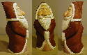 This is merely a different variation of the first santa but he is 2.66 times larger. That meant a lot more basswood and a lot more paint. He stands 11.5 inches tall. August 2002.