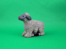 February 2010 - This is the eleventh of a 18 piece Nativity Scene. It is carved from one piece of basswood, painted with acrylics and finished with ordinary paste floor wax. He is about 2.5 inches tall and 2.5 inches long.