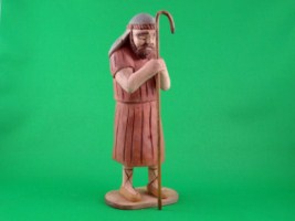 March 2010 - This is the twelveth of a 18piece Nativity Scene. It is carved from one piece of basswood, painted with acrylics and finished with ordinary paste floor wax. He is about 8 inches tall.