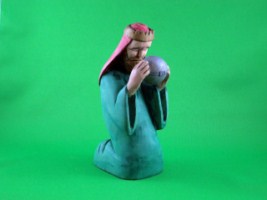 February 2011 - This is the fifteenth of a 18 piece Nativity Scene. It is carved from one piece of basswood, painted with acrylics and finished with ordinary paste floor wax. He is about 6 inches tall.