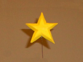 October 2011 - This is the eighteenth of a 18 piece Nativity Scene. It is carved from a piece of basswood, painted with acrylics and finished with ordinary paste floor wax. It is about 2.5 inches tall and 2.5 inches wide.