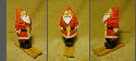 Ski Santa is lost and looking up at the stars to find his direction. He is about 4 1/2 inches tall, carved from cottonwood, painted with acrylics and finished with clear floor polish. Aug 2002.