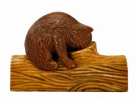 February 2012 -  This is the 6th little honey bear that I carve.  He is carved from a scrap piece of basswood, painted with acrylic paint and finished with floor wax. The log is about 5 inches long and the whole project is only about 3 inches high.