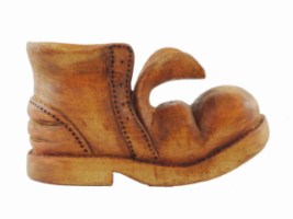 March 2012 -  This little boot was an evening project at our Regina Whittlers Carving Club.  It is carved out of basswood, measures about 4 inches long by 3 inches tall and is finished with brown shoe polish.