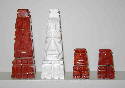 I was asked to make some missing chess pieces. The originals are on either side and are made of marble. The ones I carved from basswood are on the inside. There was no large white piece to use as a sample so I used the red one but what was needed was a white one made exaclty the same except for the color.