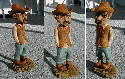 Carved from Basswood, he is 7 inches tall. I sealed the project with spray shelac and then colored with acrylic paint. Cowboy figures appeal to most everyone. These western characters represent rugged individuals. The body and face lend themsleves to rather gross exageration. Charlie's bowed legs give the impression that he has spent most of his life in the saddle. February 2002.