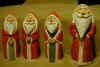 #30A, 30B, 30C and 31 - The 3 small ones (4.5 inches) are cottonwood and the larger one (5.5 inches) is basswood. All are painted with acrylic paint and each has a different hand position. Sept 2002.