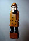 Nov 2003 - Carved from an identical item we bought in our Atlantic Canada tour. About 4 1/2 inches tall, carved from Basswood.