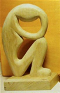 Nov 2002 - Carved from butternut wood, sanded and varnished. One of my easier and better looking carvings.