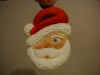Dec, 2002. Carved from basswood, he is only 3/4 inch thick and about 1 1/2 inches high. He is destined to hang in our Xmas tree.