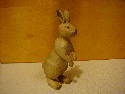 This was just a class project. The wood was sealed and then I applied a little antiquing solution. He is about 5 inches tall and carved from Basswood. - Feb. 2002.