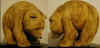 Feb 2003. This little bear can stand on his front feet with his nose on the ground and when given a little nudge, rolls forward until he lands on his feet. Carved from basswood, painted with acrylic, protected with floor wax, he stands about 4 1/2 inches tall.
