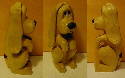 This little puppy is 5 1/2 inches tall. Carved from basswood and sealed with spray shellac. Minimum painting on this one. March 2002.